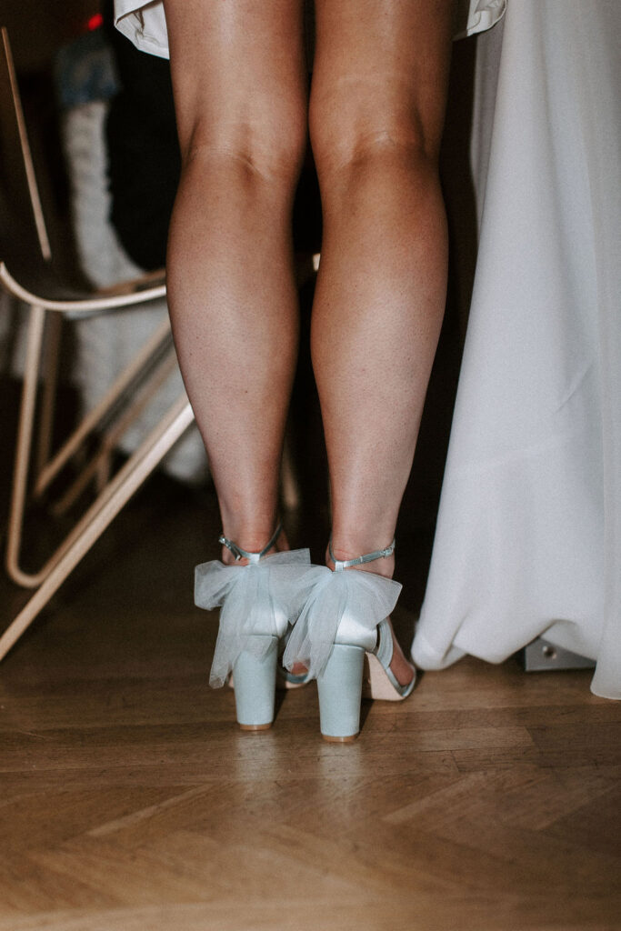 Blue wedding shoes with a ribbon tie